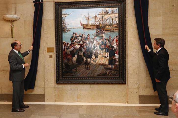 Ignacio Galán, Iberdrola's chairman, shows the painting “El Regreso”, together with its author, the painter Augusto Ferrer-Dalmau.