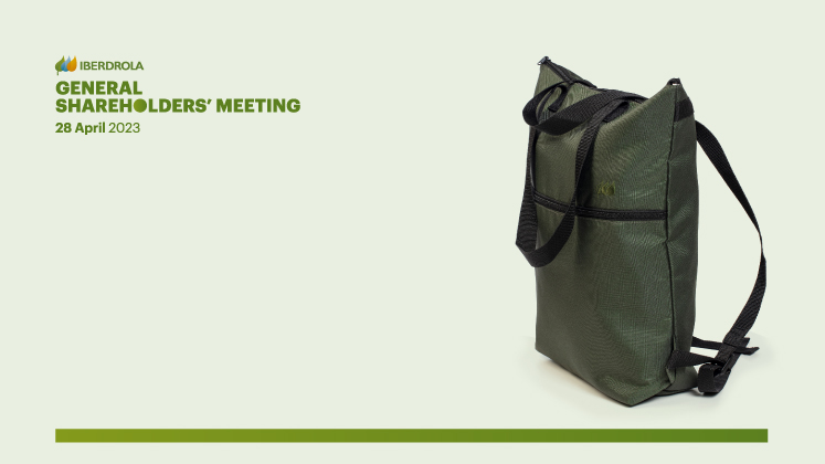 The gift is a dark green cooler backpack made from recycled plastic.