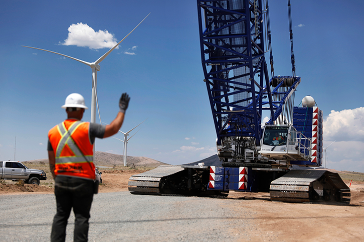 Person in construction maneuvers at the onshore wind farm in El Cabo