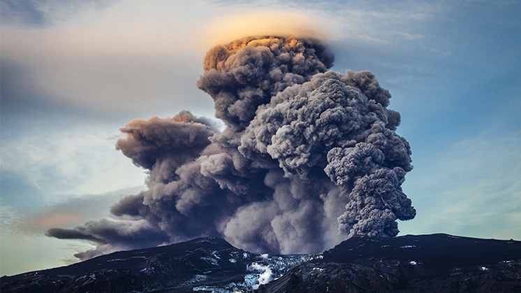 Photograph of an erupting volcano.