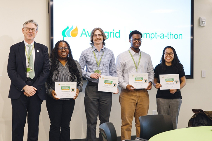 Avangrid CEO Jose Antonio Miranda with one of the winning teams. From Left to Right: D’asia Johnson, Stephen Bauer, Freddherck Leny, Emma Keeling.