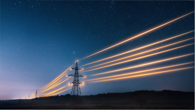 Imagen de una red eléctrica con un haz de luz pasando por sus cables